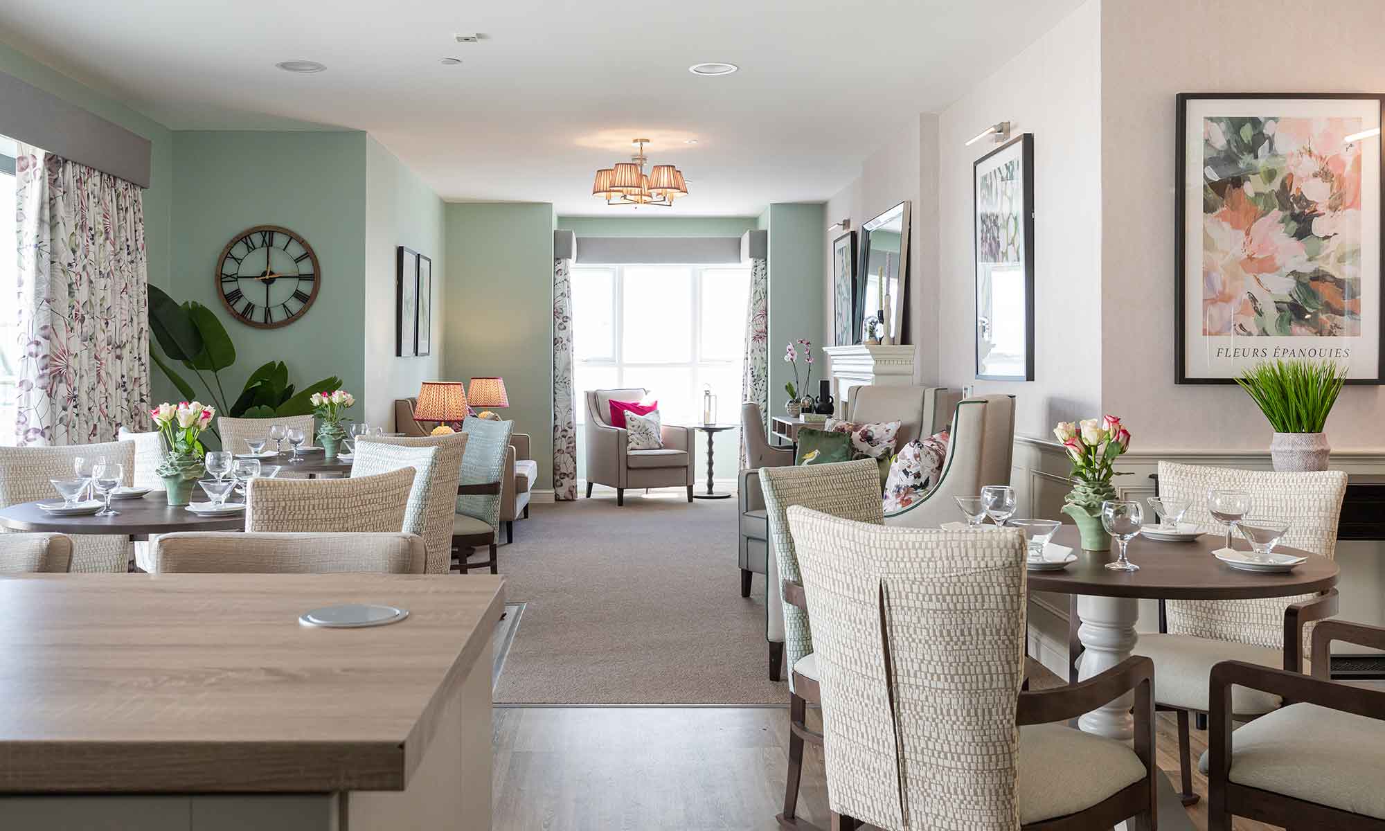 Lounge and dining area at a care home. Orto high back chair with Aberford pedestal table in distance, Assisi dining chairs with Woodbury dining table