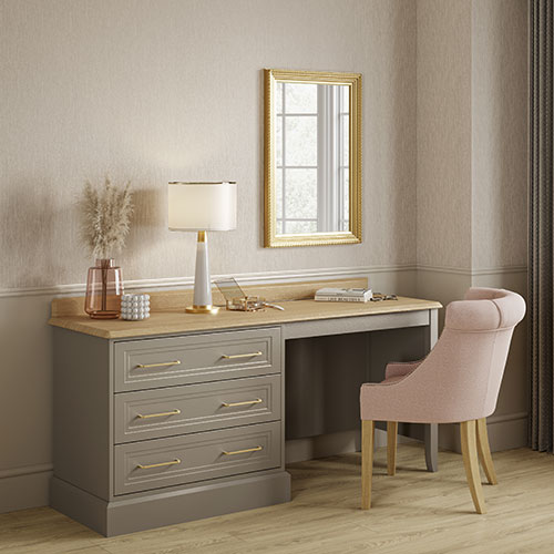 A dressing table and chair