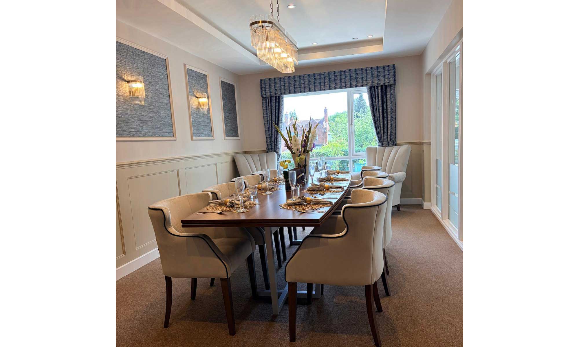 Private dining room at Bellerose Manor with upholstered care home dining chairs, dining table and coordinated soft furnishings.